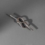 KNOT BROOCH IN SILVER PLATED METAL